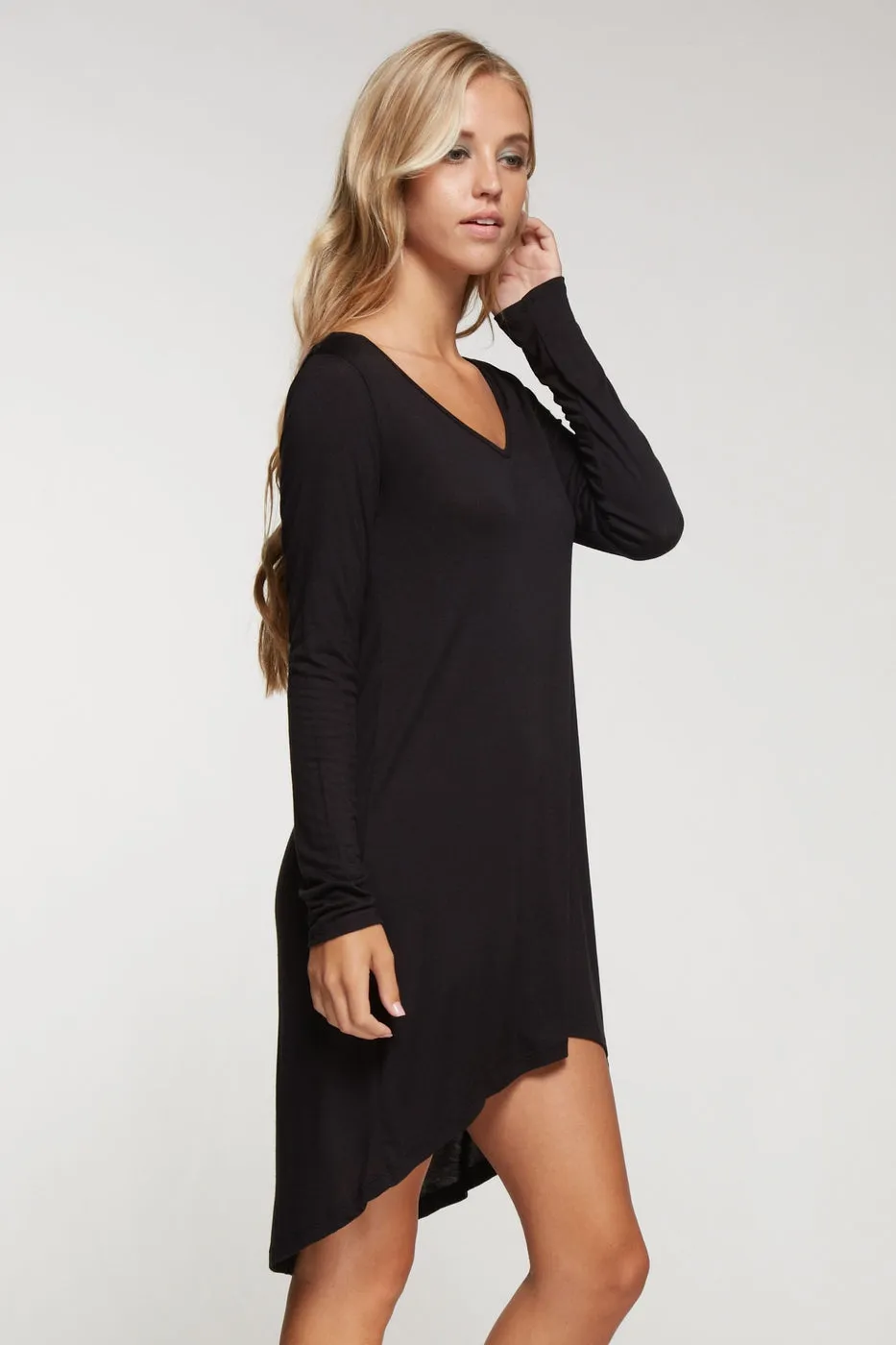 Long sleeve solid knit dress with hi-low bottom hem