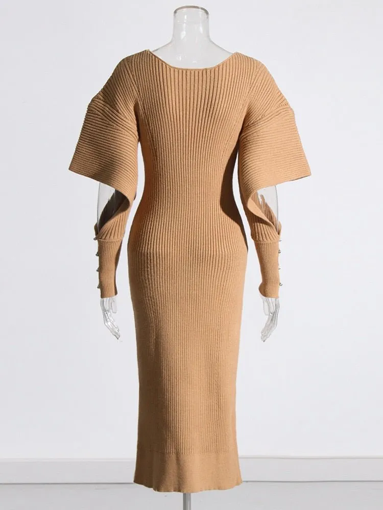 Pre Order:  Dramatic Shoulder Knit Dress